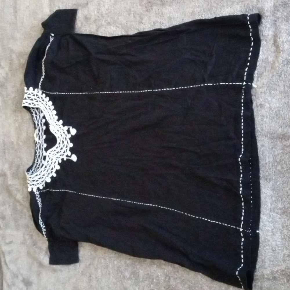 Matta black tunic minidress with lace collar and tassels